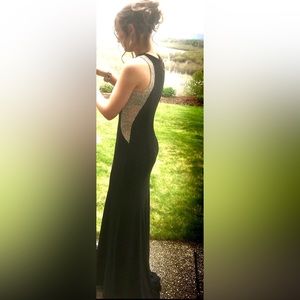 Small black fitted prom dress with sheer sparkles on sides